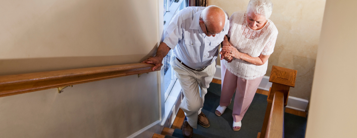 Couple safely going up the stairs